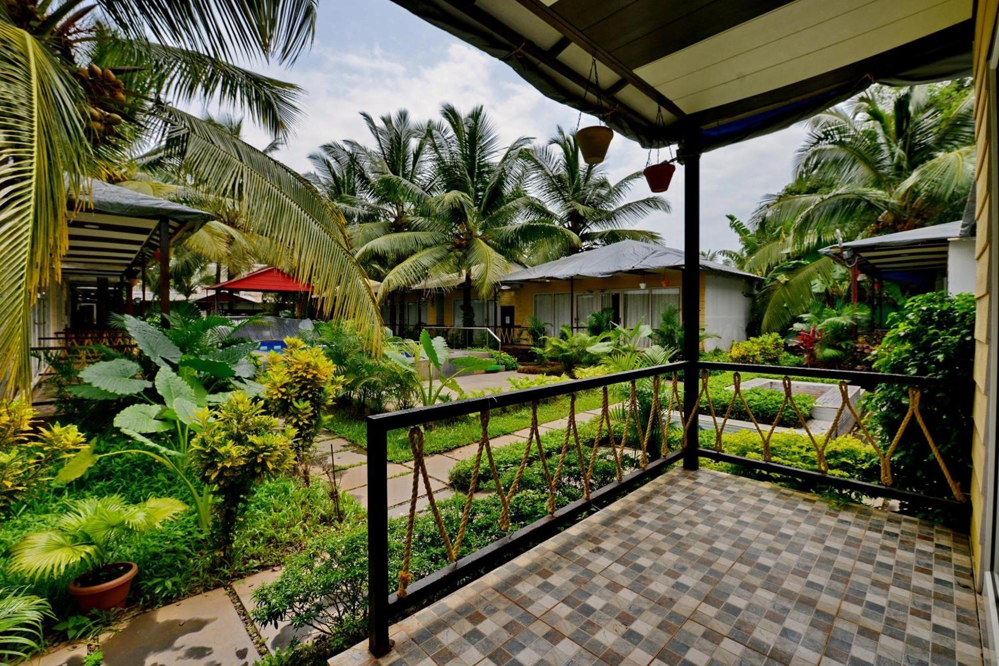 Collection O Retreat Morjim Resort Esterno foto