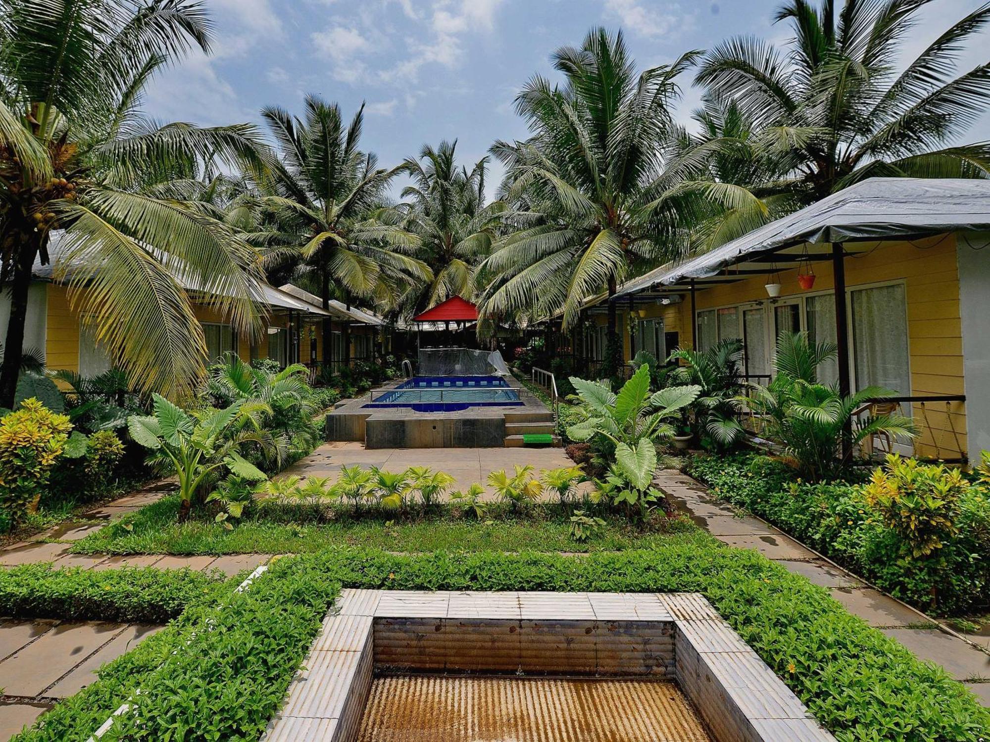 Collection O Retreat Morjim Resort Esterno foto