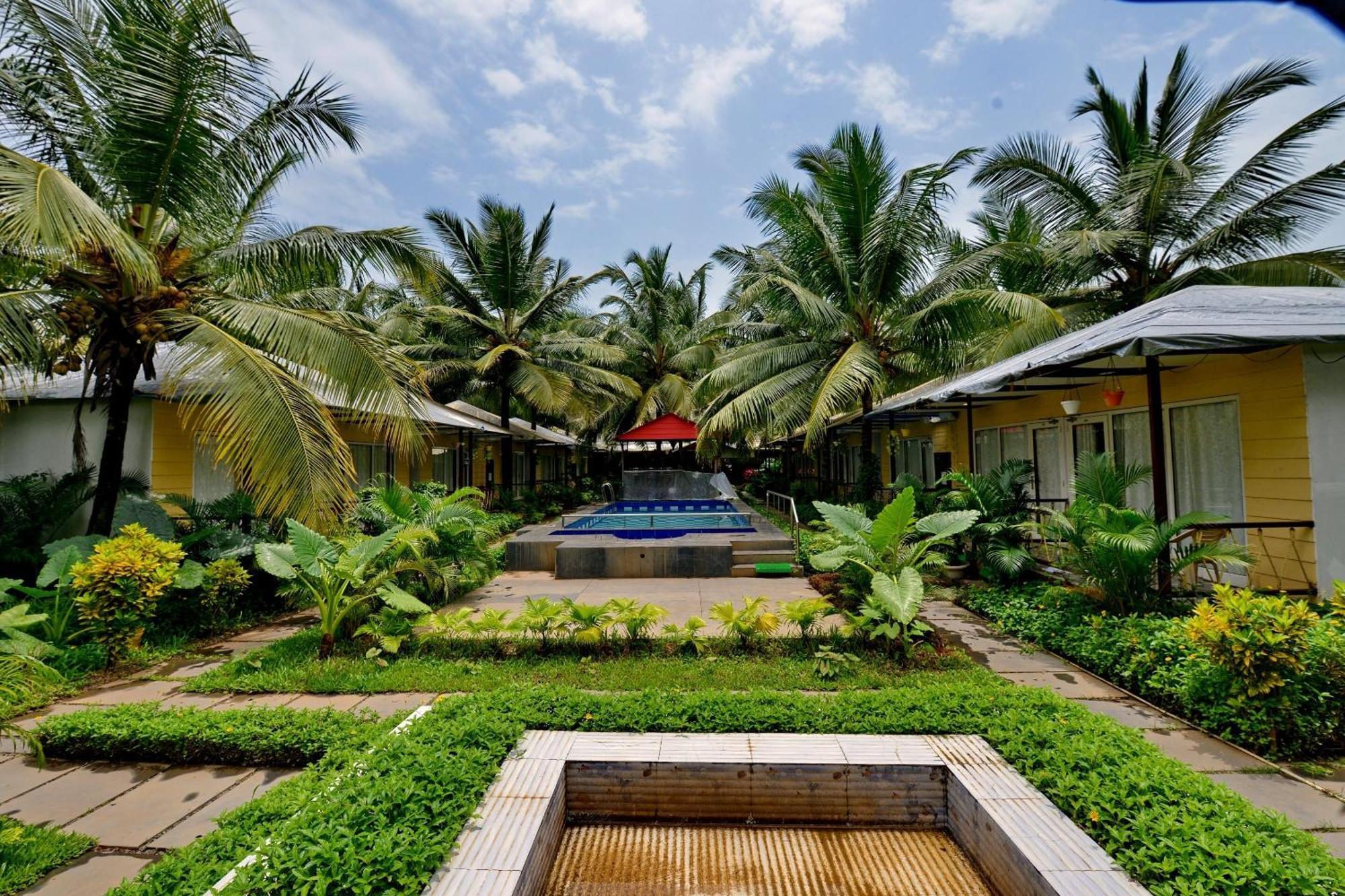 Collection O Retreat Morjim Resort Esterno foto