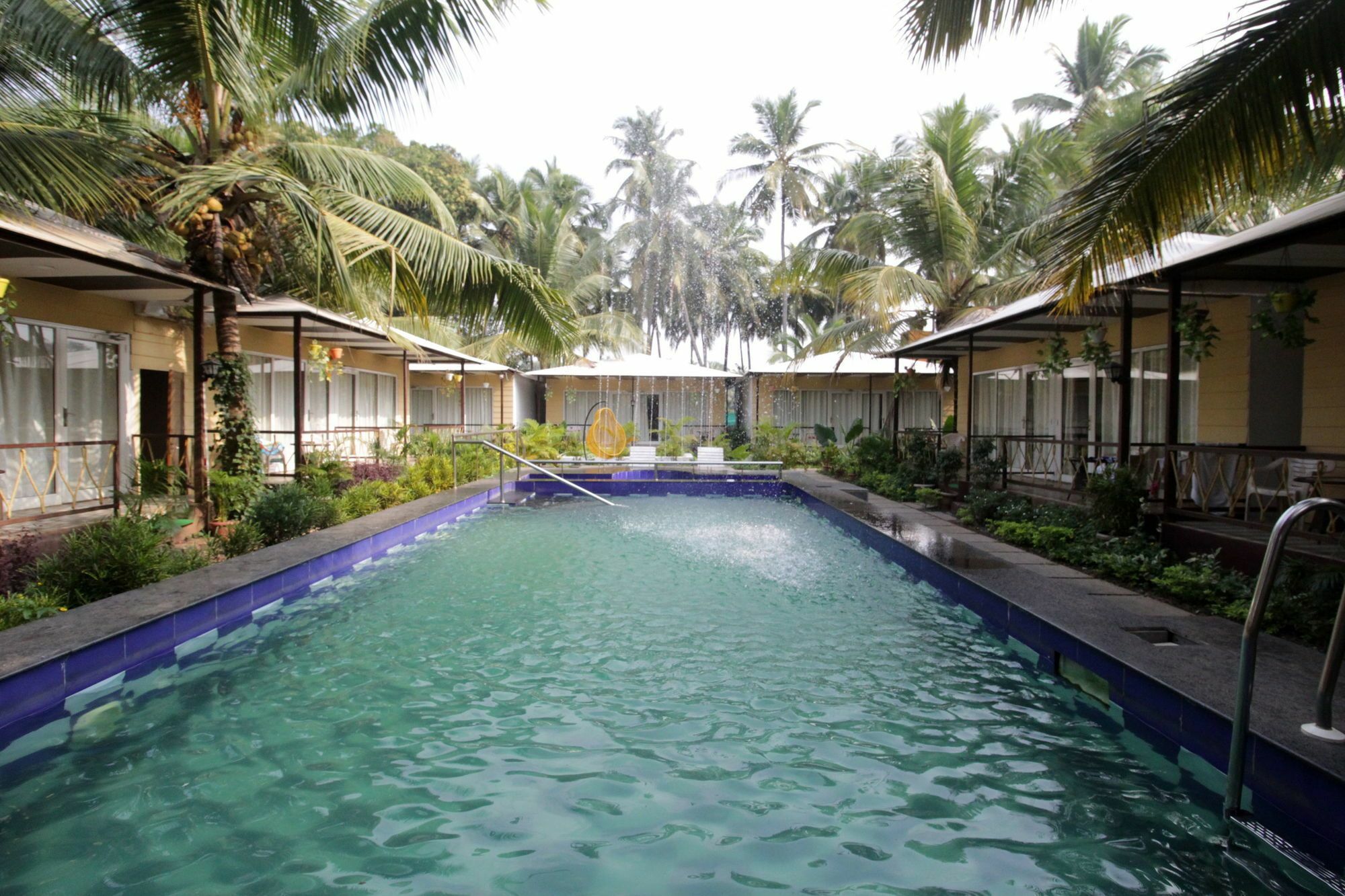 Collection O Retreat Morjim Resort Esterno foto